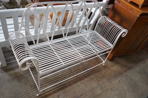 A Victorian style painted wrought iron garden bench, length 137cm, depth 43cm, height 92cm